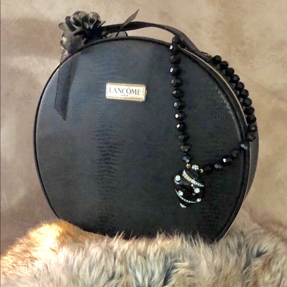 Lancome Handbags - LANCOME black makeup bag escort bag NWT